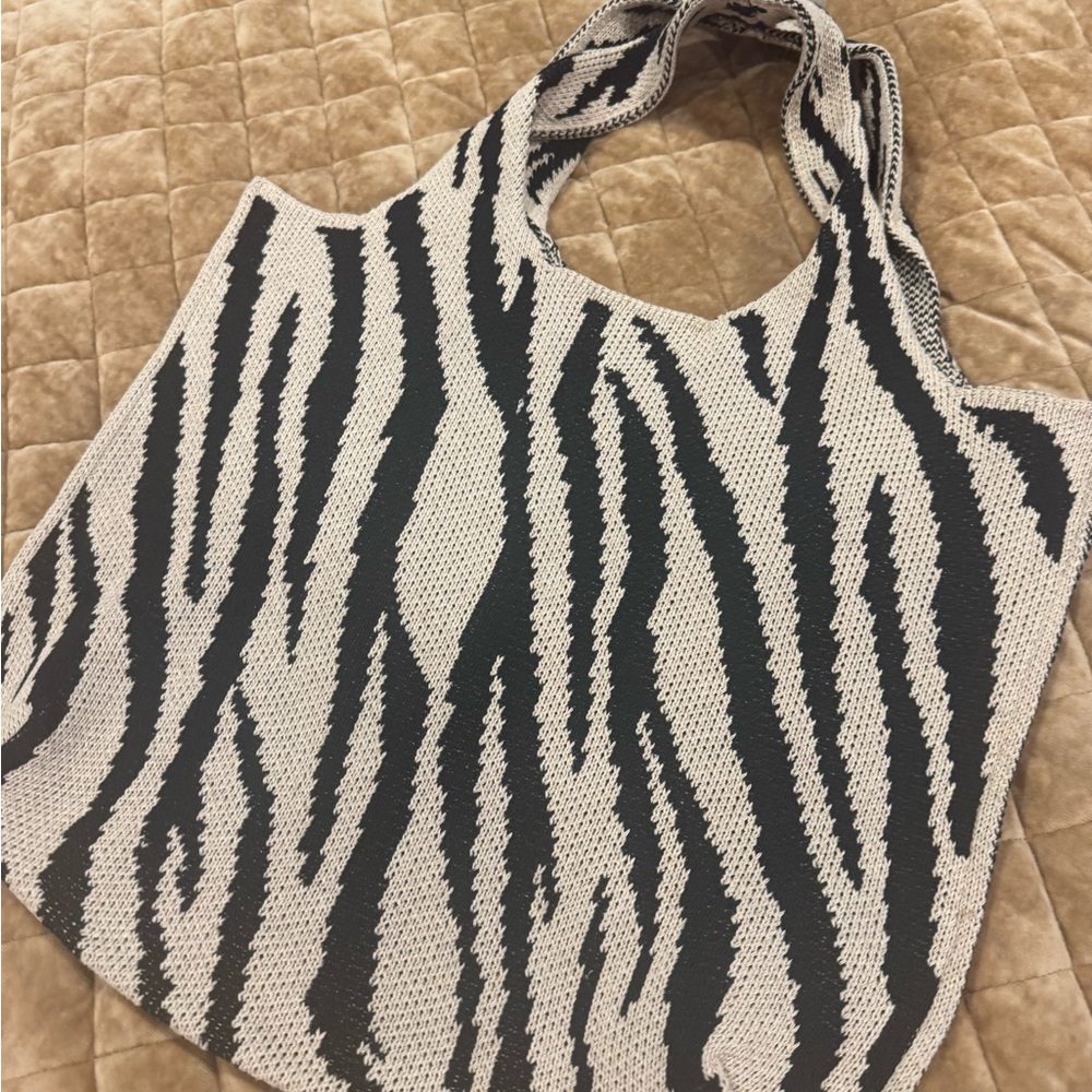 Anthropologie Zebra Pattern Tote in Black and Cream